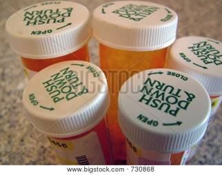 Stock photo : Tops Of Pill Bottles